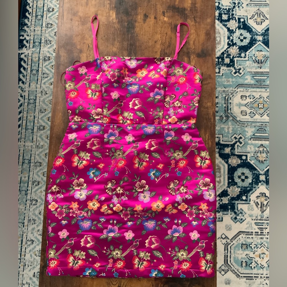 Beautiful pink dress with intricate floral stitching